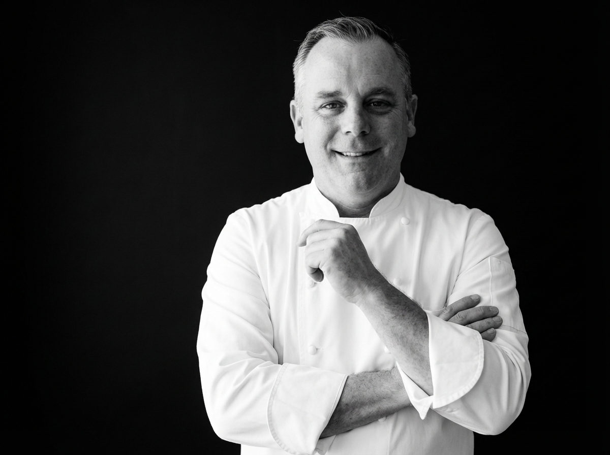 A group enjoying a joyful dinner party with elegant dishes and wine.